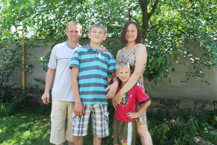 Yevhen Hurianov and Natalia Kulakivska with their two sons Yehven, 16, and Nazar, 10. 