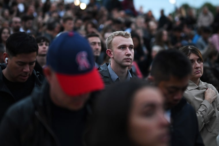 Image: Crowds gather in front of Buckingham Palace to pay their respects following the death of Queen Elizabeth II on Thursday.