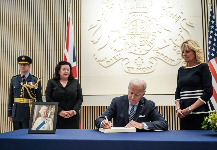 Image: President Joe Biden signs the condolence book at the British Embassy in Washington to pay his respects following the death of Queen Elizabeth II, as first lady Jill Biden and British ambassador to the U.S. Karen Pierce look on, on Sept. 8, 2022.