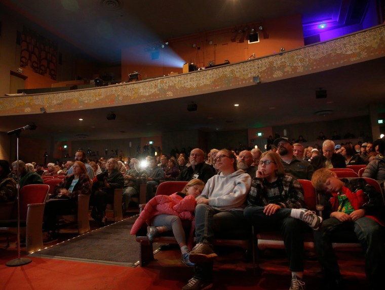 Image: Families seeking information from police and fire officials fill the State Theater in Oroville, Calif., on day five of the deadly Camp Fire on Nov. 12, 2018.