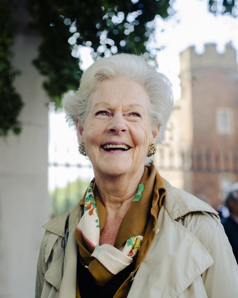 Virginia Forbes waits outside St. James's Palace. 