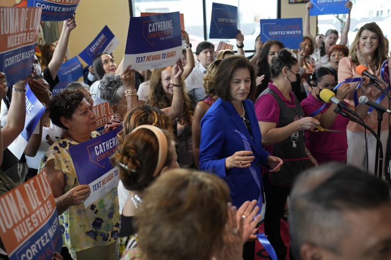 U.S. Sen. Catherine Cortez Masto, D-Nevada, is surrounded by supporters as she attends a campaign event at a Mexican restaurant on Aug. 12, 2022, in Las Vegas.