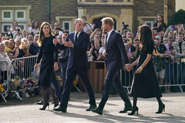 Prince William and Kate, Princess of Wales, left, and Britain's Prince Harry and Meghan, Duchess of Sussex