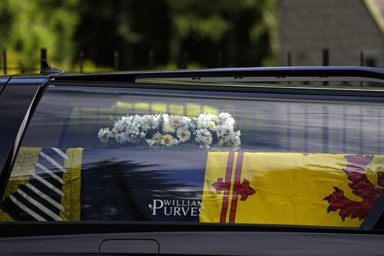 The coffin was draped in the Royal Standard. 