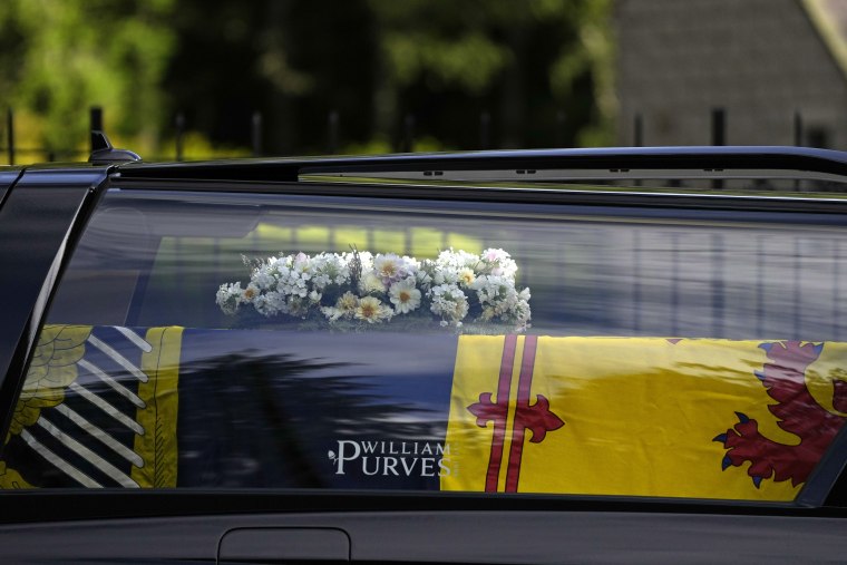 The coffin was draped in the Royal Standard.