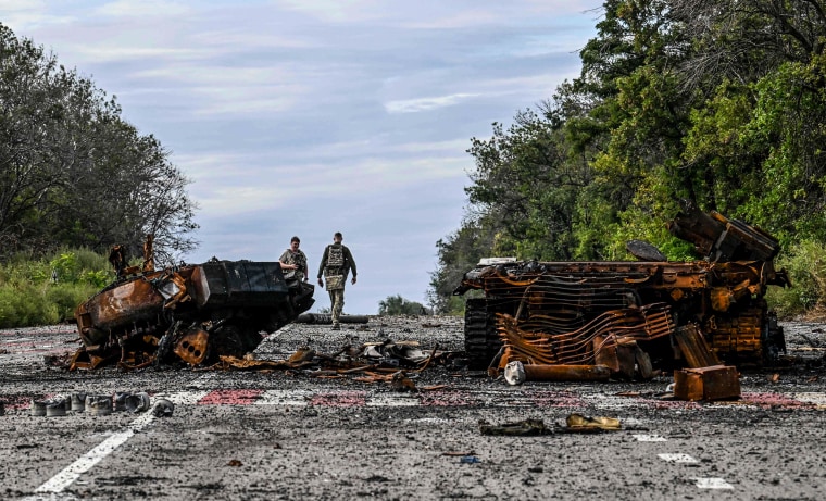 Image: Destroyed armored vehicles litter the road in Balakliya, Kharkiv region, Ukraine on Sept. 10, 2022.