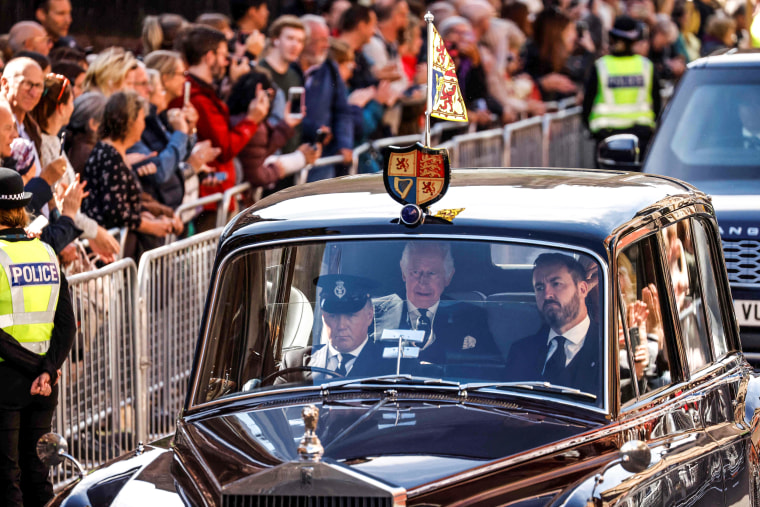 Image: King Charles III and Camilla, Queen Consort are driven along the Royal Mile towards the Palace of Holyroodhouse, in Edinburgh, Scotland on Sept. 12, 2022.