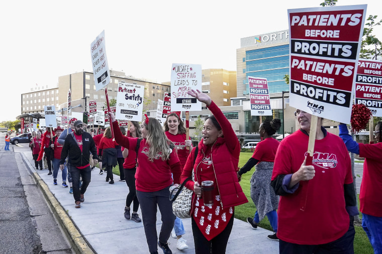 Nurses strike outside North Memorial Health Hospital in Robbinsdale, Minn., on Sept. 12, 2022.