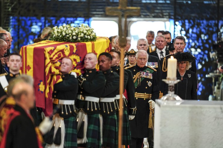 Image: King Charles III and Camilla, the Queen Consort, Princess Anne and Tim Laurence, and Prince Andrew follow the coffin as they enter the cathedral for a Service of Prayer and Reflection for the Life of Queen Elizabeth II at St Giles' Cathedral, Edinburgh on Sept. 12, 2022.