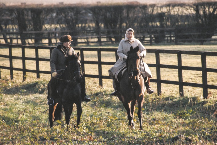 Princess Anne and Queen Elizabeth II horse riding on the Sandringham estate in Sandringham, Norfolk, England, in 1979.