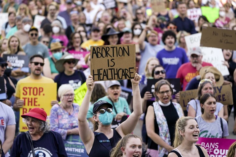 Abortion-rights protesters at a rally outside the Michigan State Capitol in Lansing after the Supreme Court's decision to overturn Roe v. Wade on June 24.