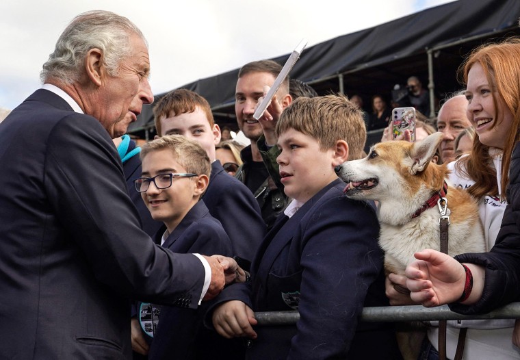 Image: Britain's King Charles III greets wellsishers as he arrives at Hillsborough Castle in Belfast on Sept. 13, 2022, during his visit to Northern Ireland.