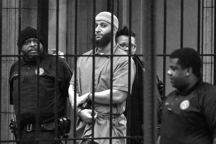 Officials escort Adnan Syed from the courthouse following the completion of the first day of hearings for a retrial in Baltimore on Feb. 3, 2016.