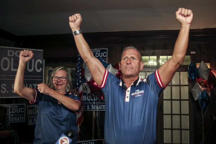 Republican Senate candidate Don Bolduc and his wife Sharon celebrate during a primary night campaign gathering on Sept. 13, 2022, in Hampton, N.H.