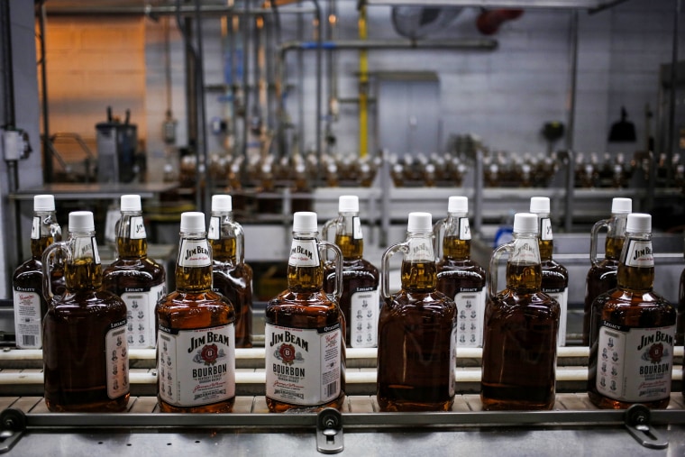 Bottles of bourbon make their way down a conveyor belt inside the bottling plant at the Jim Beam Bourbon Distillery on Jan. 13, 2014 ,in Clermont, Ky.