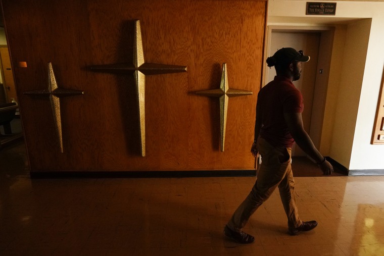 A voter heads to the polling station in the Kansas primary election at Merriam Christian Church
