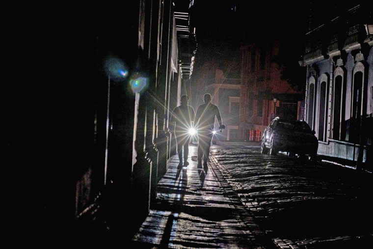 A dark street in San Juan after a major power outage on April 6, 2022.