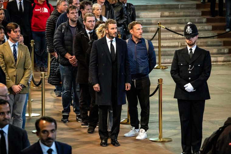 Image: David Beckham waiting to pay his respects to the coffin of Queen Elizabeth II, lying in state inside Westminster Hall, at the Palace of Westminster in London on Sep. 16, 2022.