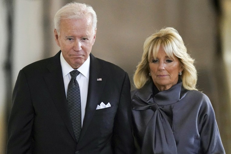 President Joe Biden and First Lady Jill Biden view the coffin of Queen Elizabeth II lying in state on the catafalque in Westminster Hall, London, on Sept. 18, 2022.