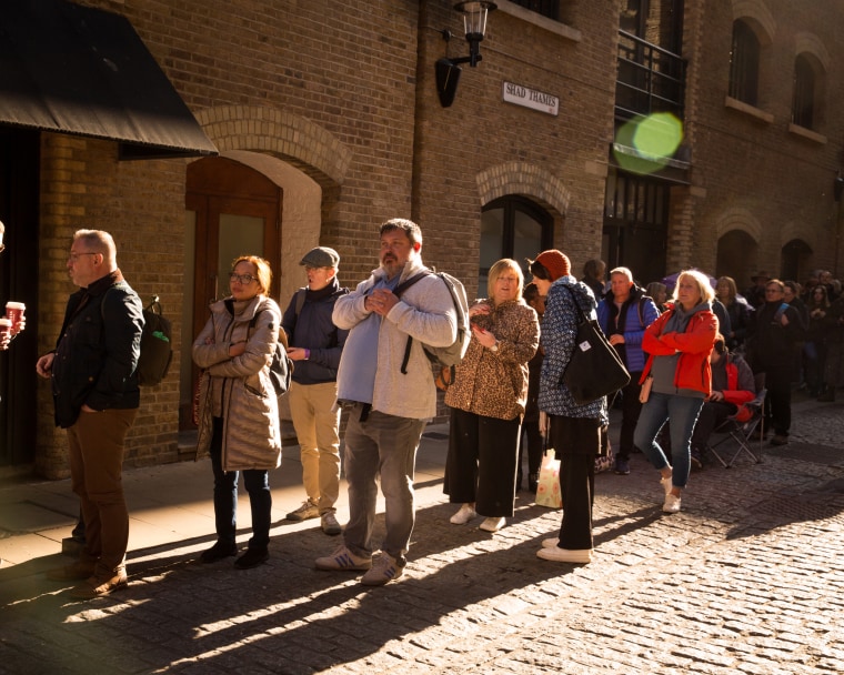 Image: Mourners wait in line to see the lying-in-state of Queen Elizabeth II in London.