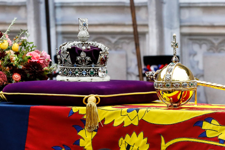 Image: The coffin of Queen Elizabeth II, draped in the Royal Standard, from the State Gun Carriage of the Royal Navy is pictured at Westminster Abbey in London on Sept. 19, 2022, ahead of the State Funeral Service.