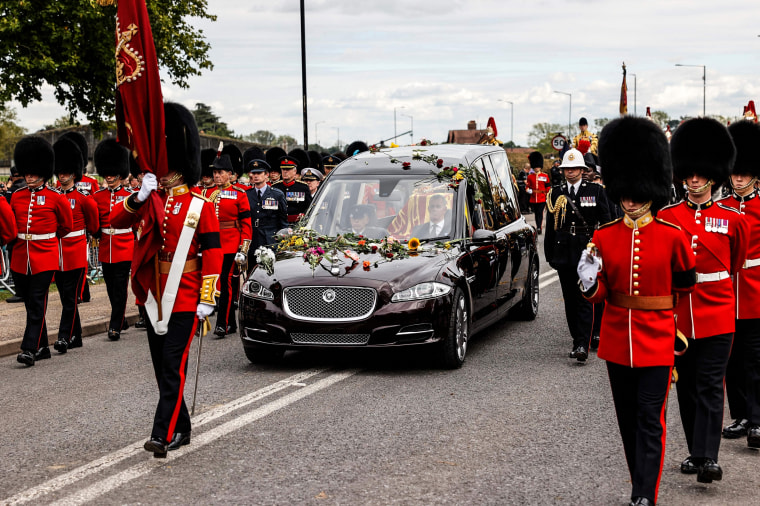 Image: The Procession following the coffin of Queen Elizabeth II, aboard the State Hearse, arrives at The Long Walk in Windsor on Sept. 19, 2022, to make its final journey to Windsor Castle after the State Funeral Service of Britain's Queen Elizabeth II.