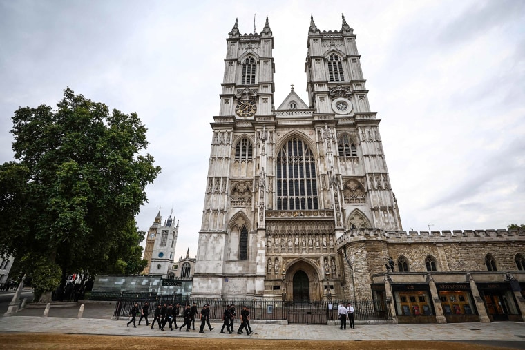 Image: Police officers patrol outside Westminster Abbey in London on Sept. 19, 2022, ahead of the State Funeral Service for Britain's Queen Elizabeth II.
