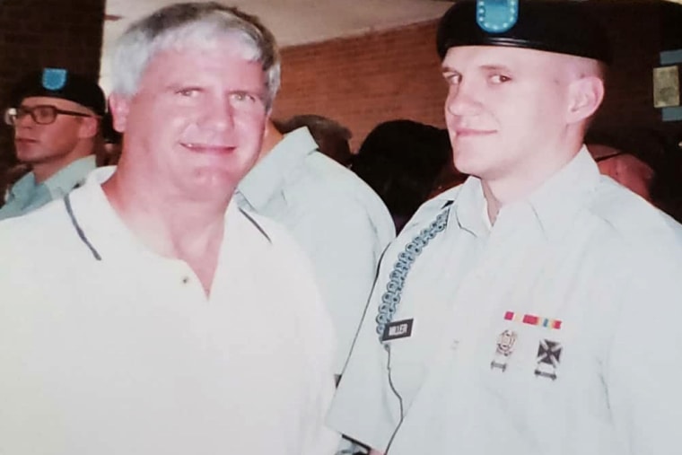 Image: Tony Miller, right, and his father after Miller's graduation from basic training in 2005.