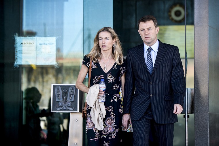 Kate McCann and her husband Gerry McCann leave the court house in Lisbon after delivering statements in their case against Portuguese police officer Goncalo Amaral on July 8, 2014.