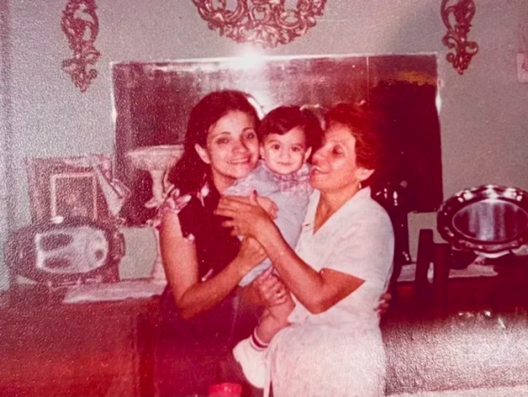 Image: Agustin with his mother and grandmother.