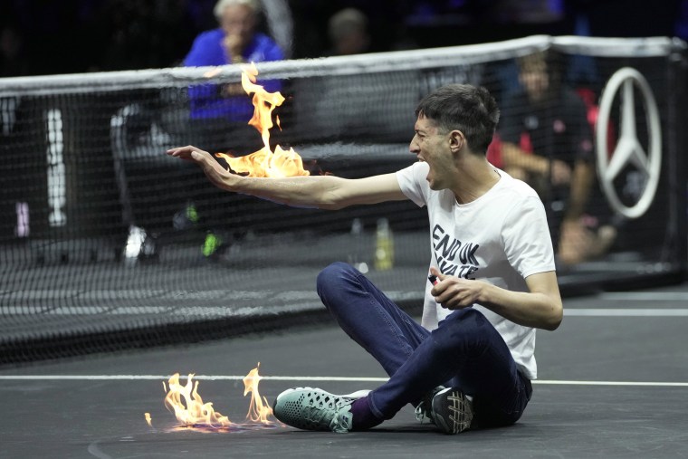 A man sets himself on fire during a protest at the Laver Cup tennis tournament
