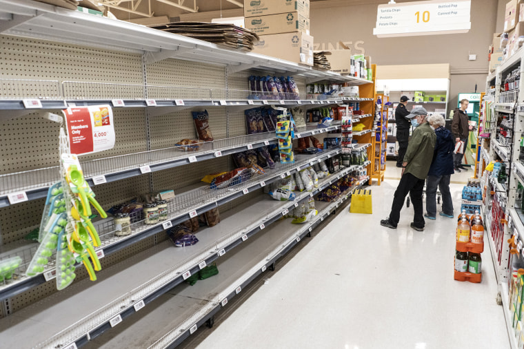 Photo: Empty shelves seen in a grocery store as shoppers stock up on food before Hurricane Fiona makes landfall in Halifax on September 23, 2022.