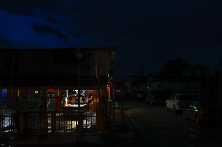 People play pool in a bar on Sept. 20, 2022, in Cabo Rojo, Puerto Rico.