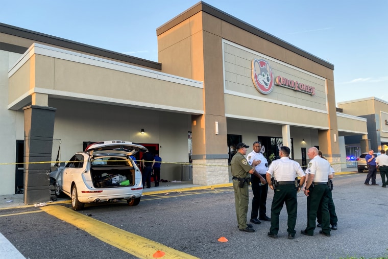 Police respond to a shooting at a Chuck E. Cheese location in Brandon, Fla, on Sept. 24, 2022.