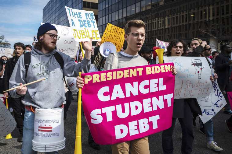 People march against student debt around the U.S. Department of Education
