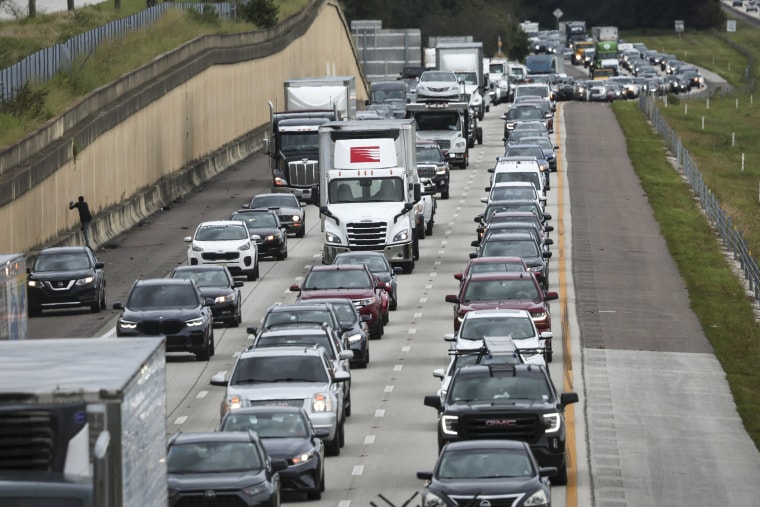 Heavy traffic moves slowly on I-4 East as residents evacuate the Gulf Coast of Florida in advance of the arrival of Hurricane Ian on Sept. 27, 2022, in Four Corners, Fla.