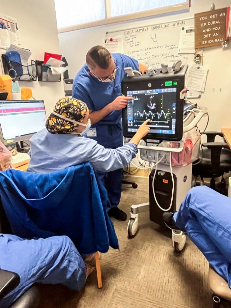 Dr. Cesar Padilla trains Areli Valencia, a Stanford medical student.