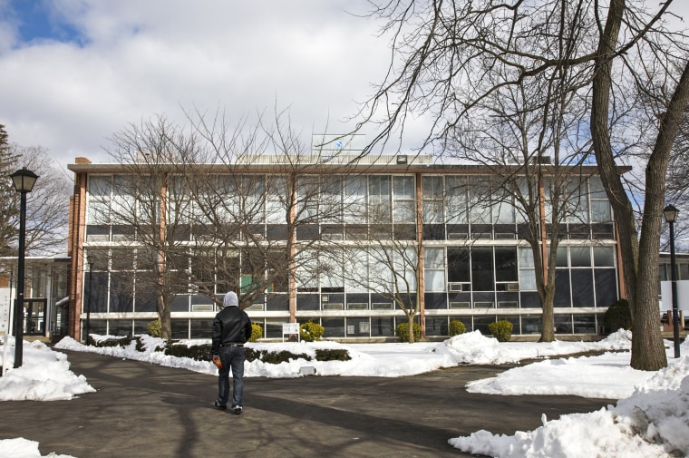 A student walks on the campus of Fairleigh Dickinson University, in Teaneck, N.J.