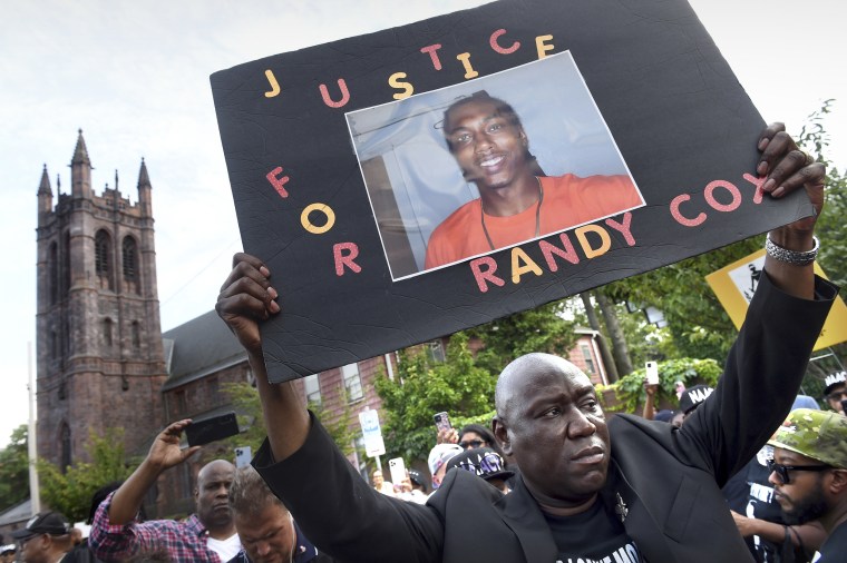 Civil rights attorney Benjamin Crump takes part in a march for Justice for Richard "Randy" Cox in New Haven, Conn., on July 8.
