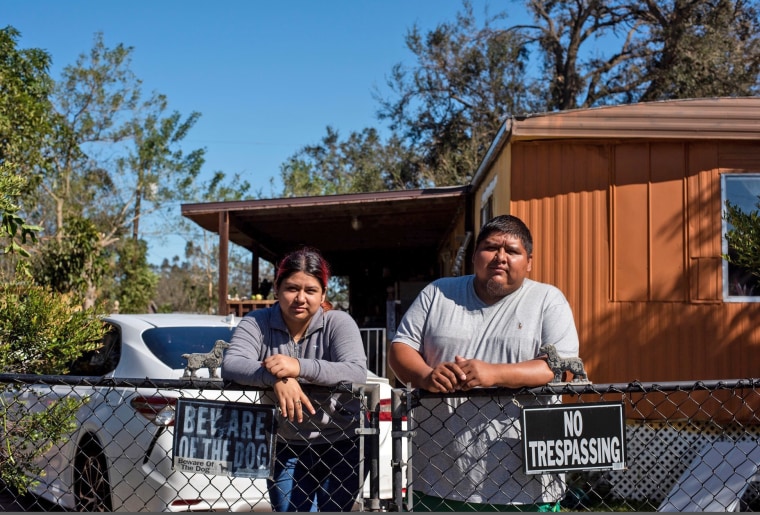 Citlali, 15, and Martin Herrera. Unlike some other nearby residences, their home was undamaged.