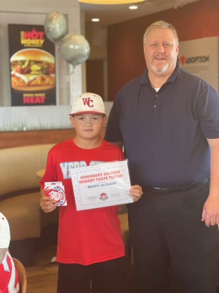 Regional Wendy's manager David Brown presented Brody Jackson a certificate that named him Wendy's "Honorary Chicken Nuggets Taste Tester."