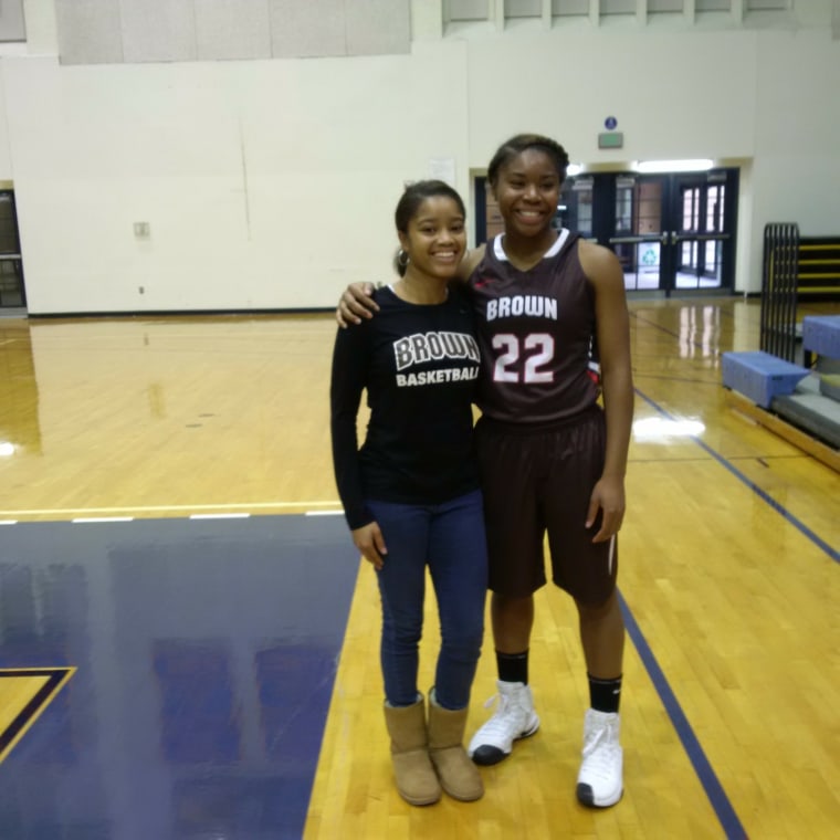 My sister (left) and me (right) after an away basketball game in college.