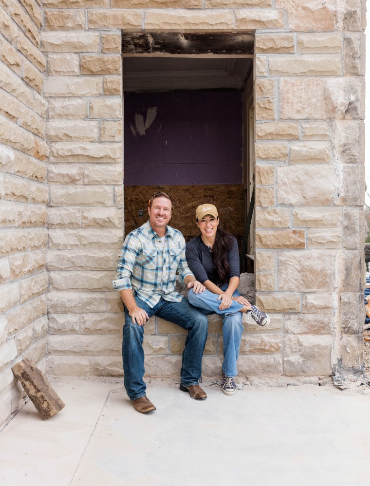 Chip and Joanna Gaines cheese in front of their castle, which Chip has had his eye on for two decades.