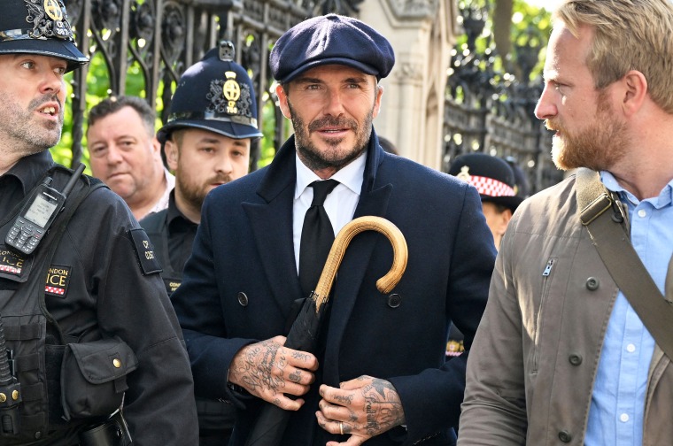 David Beckham leaves Westminster Hall.