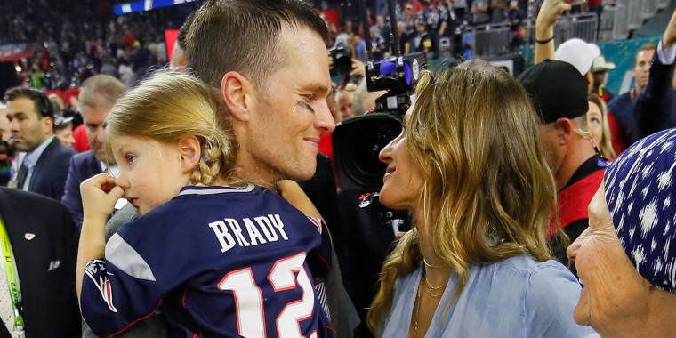 Tom Brady celebrates with Gisele Bundchen and daughter Vivian after he and the New England Patriots defeated the Atlanta Falcons during Super Bowl 51 in 2017.