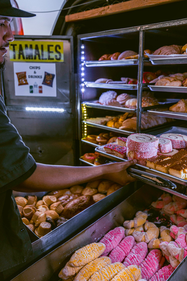 Ernesto Botello of Zeledon’s Bakery on Wheels with a selection of pan dulce.