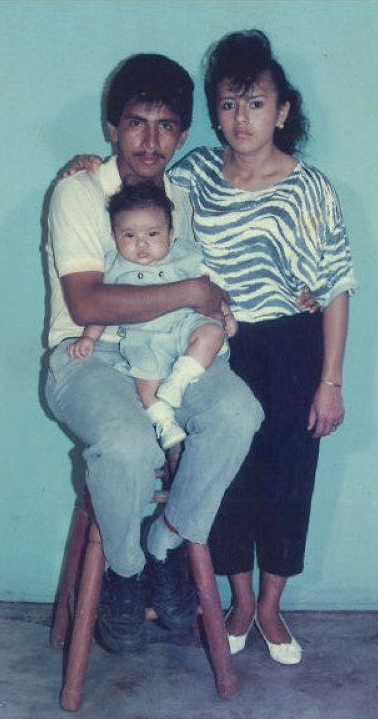 A photo of the author as a baby, with his parents.