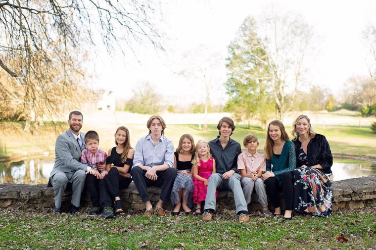 Mom Jessica Ronne, far right, is pictured with her large blended family.