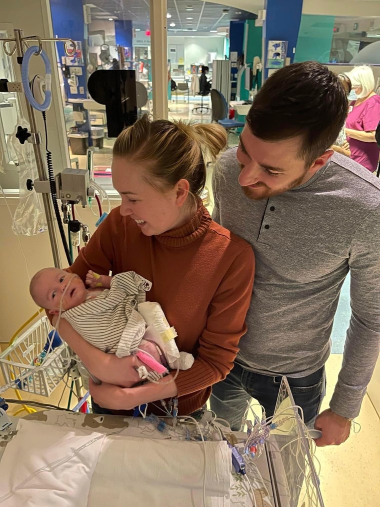 For the first 37 days of Conrad's life, his mom Austyn Evans and dad Branden Williams couldn't hold him because he was hooked up to so many machines and wires. When they finally could, Carly Miller, his nurse, was there to celebrate with them.