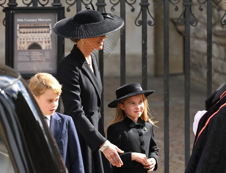 Princess Charlotte with Catherine, Princess of Wales, and Prince George at Queen Elizabeth's funeral